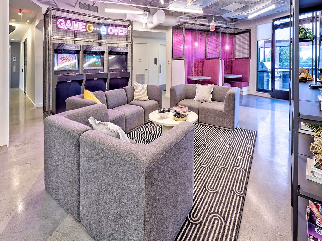 a living room with couches and a coffee table